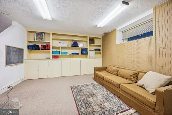 a living room with furniture and a couch