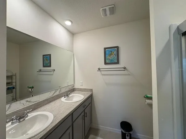 a bathroom with a toilet and a sink