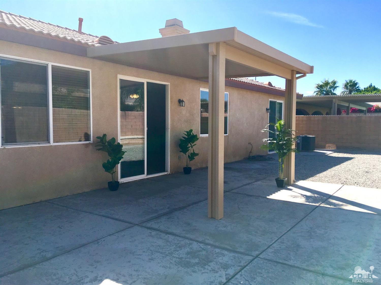 80722 Diamondback Trail Indio, CA 92201 - Photo 9 of 9 a view of a house with a patio