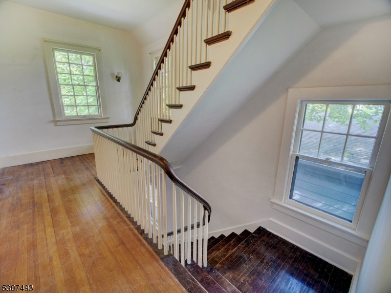 449 Grove Street Montclair, NJ 07043 - Photo 11 of 23 a view of entryway and hall with wooden floor