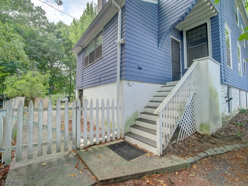449 Grove Street Montclair, NJ 07043 - Photo 14 of 23 a view of a house with wooden floor and stairs