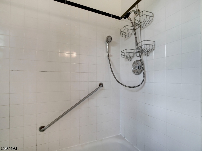 449 Grove Street Montclair, NJ 07043 - Photo 18 of 23 a bathroom with a shower
