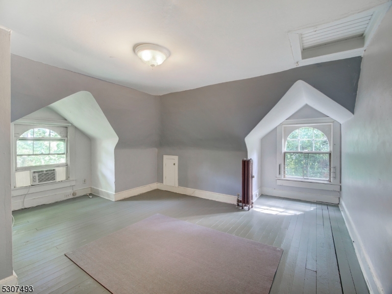 449 Grove Street Montclair, NJ 07043 - Photo 20 of 23 an empty room with windows