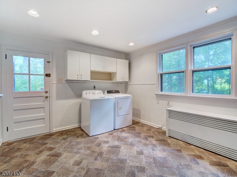 449 Grove Street Montclair, NJ 07043 - Photo 9 of 23 a room with a bed and a window