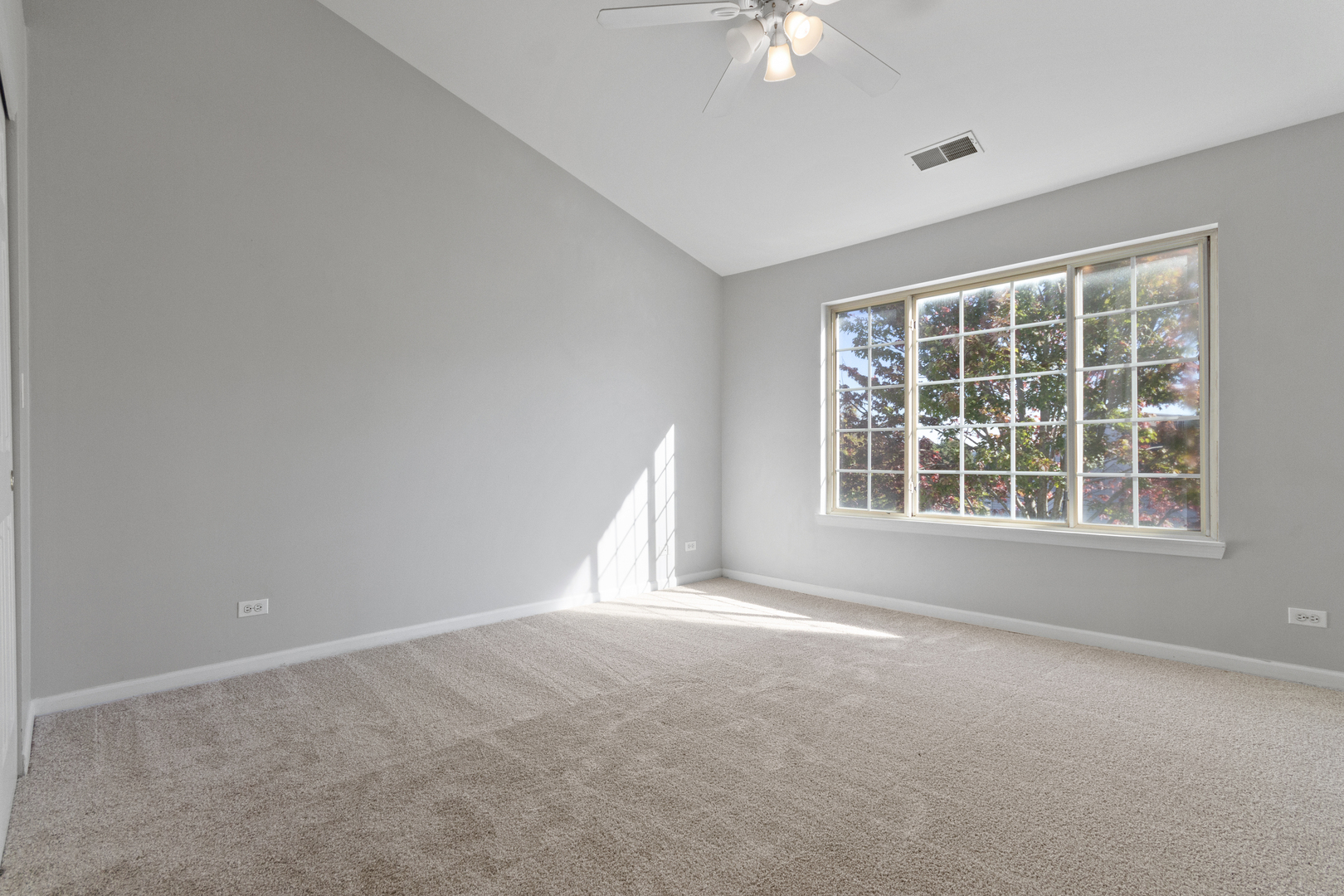 3473 Ravinia Circle Aurora, IL 60504 - Photo 12 of 17 an empty room with a window