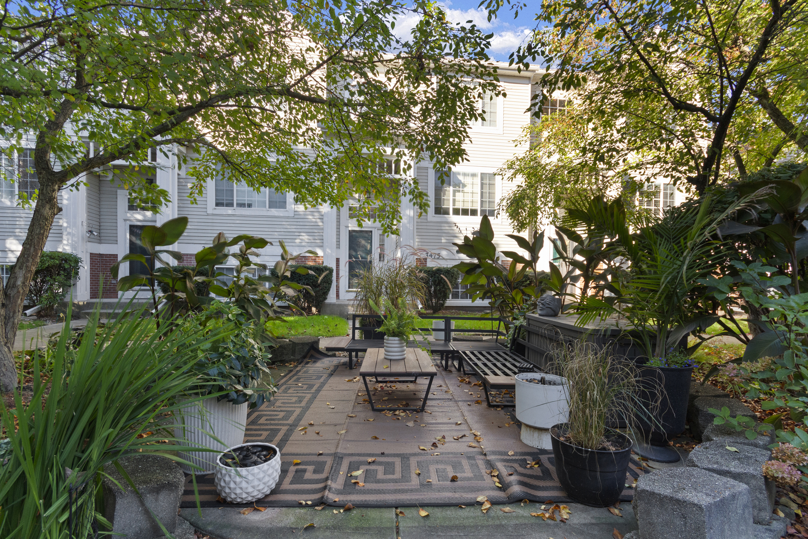 3473 Ravinia Circle Aurora, IL 60504 - Photo 16 of 17 a backyard of a house with lots of green space