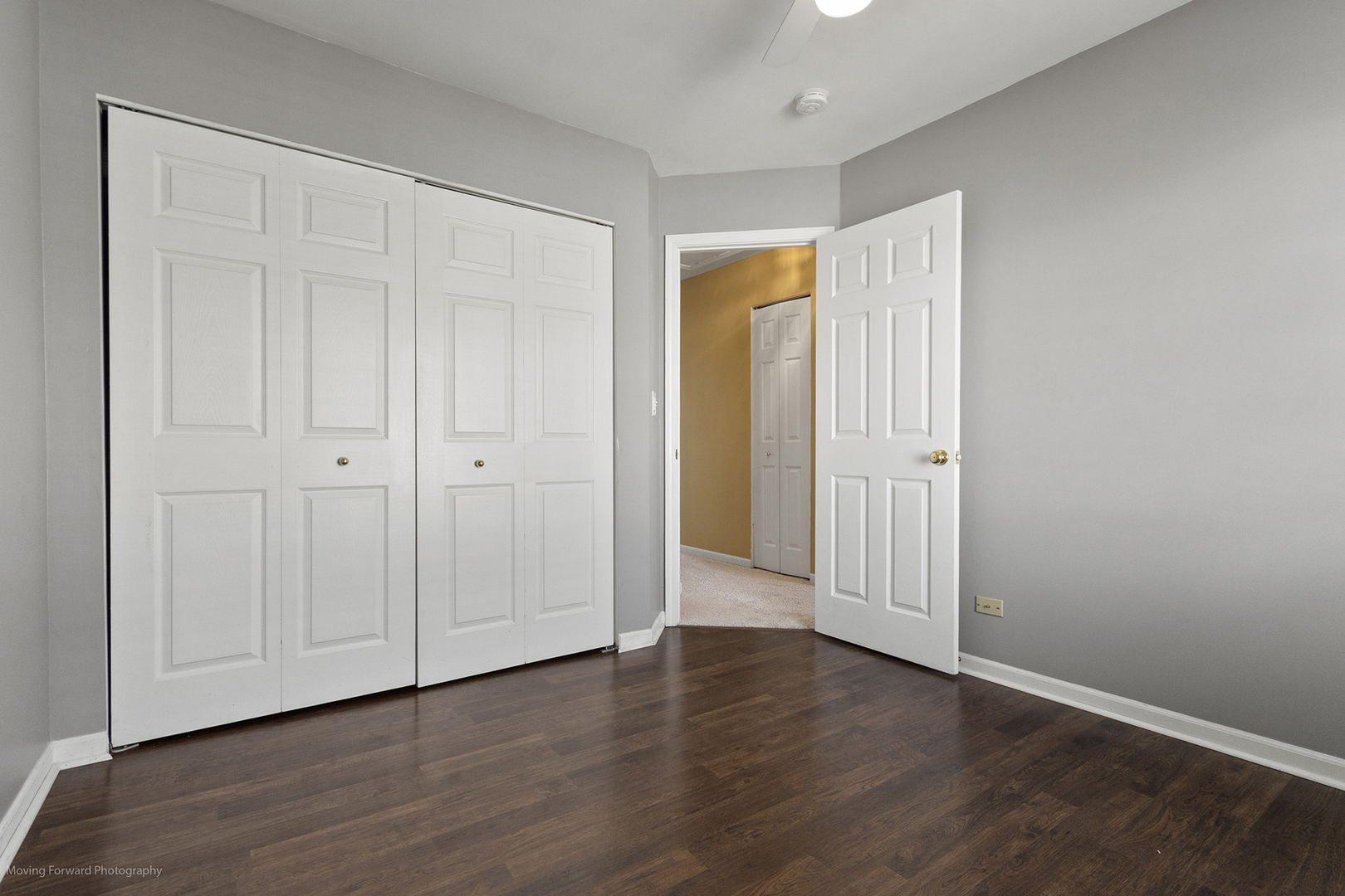 3473 Ravinia Circle Aurora, IL 60504 - Photo 10 of 17 a view of an empty room with wooden floor
