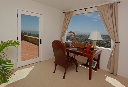 401 Las Alturas Road Santa Barbara, CA 93103 - Photo 8 of 18 a view of a dining room with furniture and a window