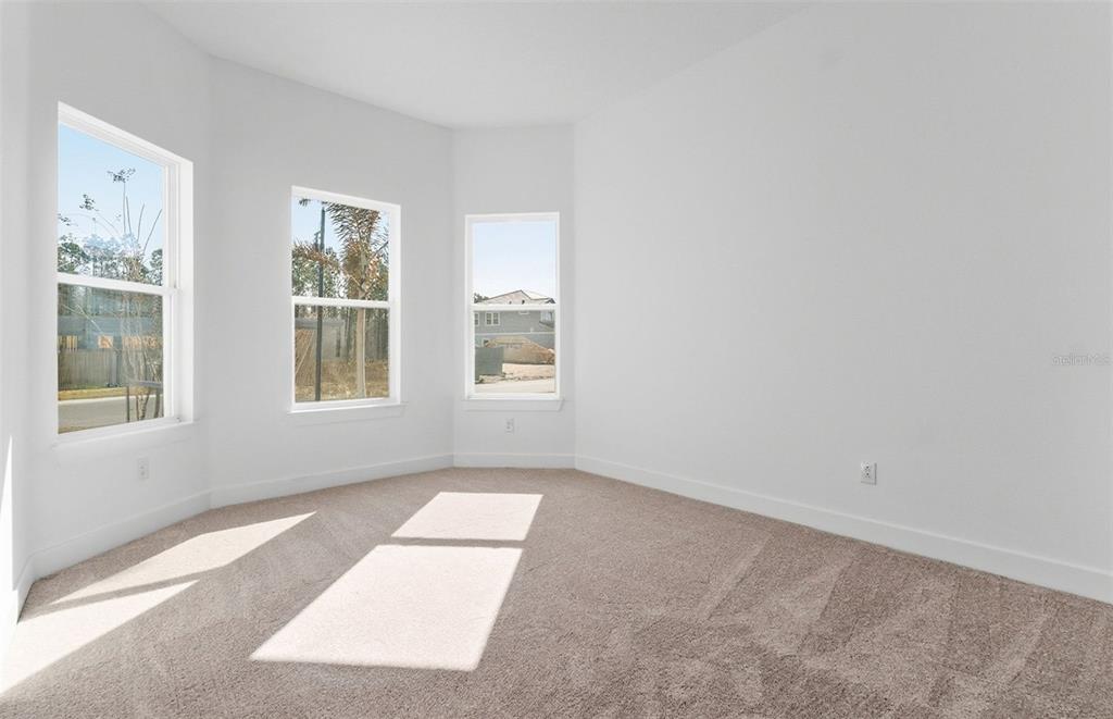 1683 Valier Point Zephyrhills, FL 33541 - Photo 11 of 20 an empty room with windows