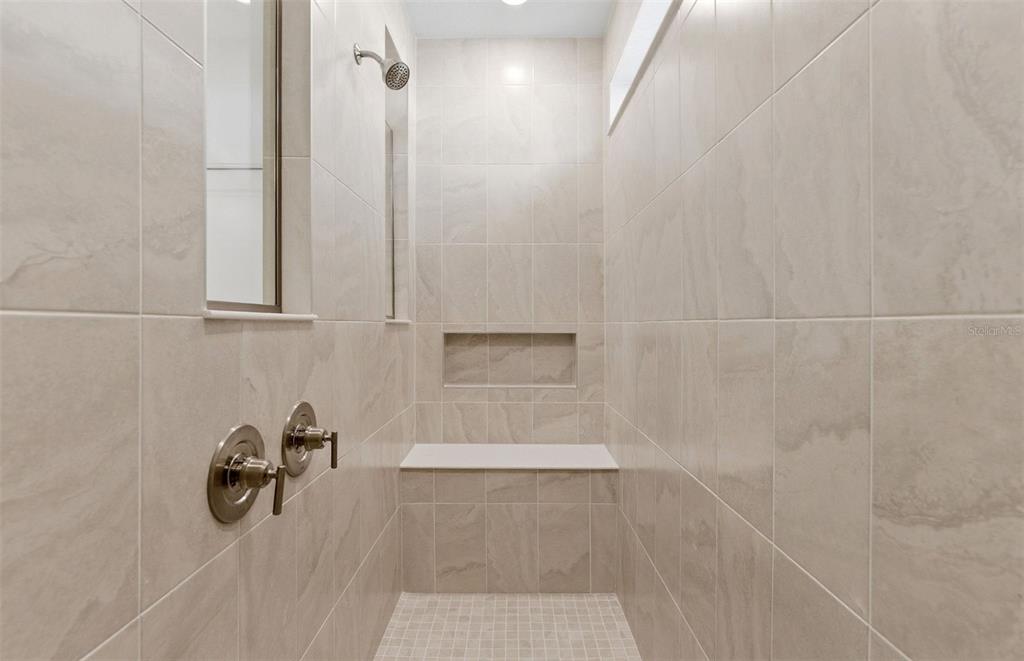 1683 Valier Point Zephyrhills, FL 33541 - Photo 9 of 20 a bathroom with a shower