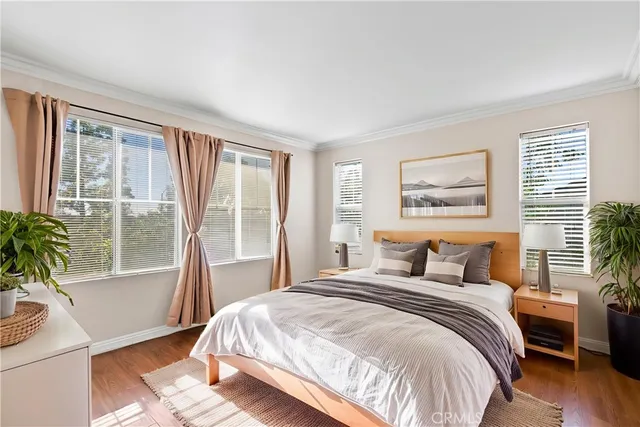 a bathroom with a granite countertop sink mirror and bathtub
