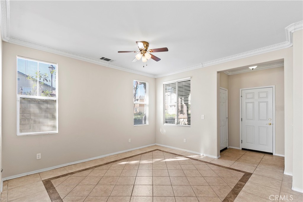 6837 Cosmos Street Chino, CA 91710 - Photo 5 of 36 a view of an empty room with a window