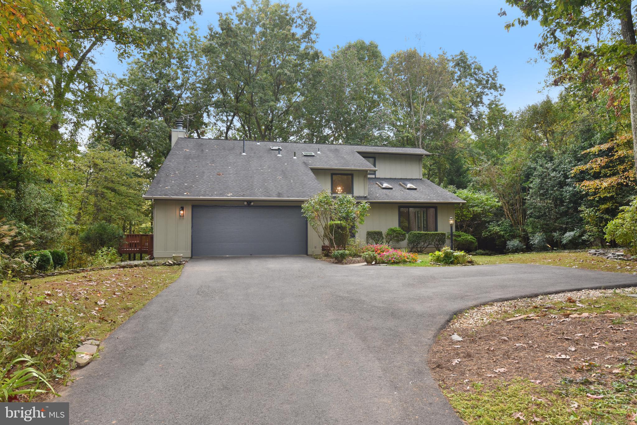 11117 Glade Drive Reston, VA 20191 - Photo 3 of 75 Extra parking space to the right of the driveway!