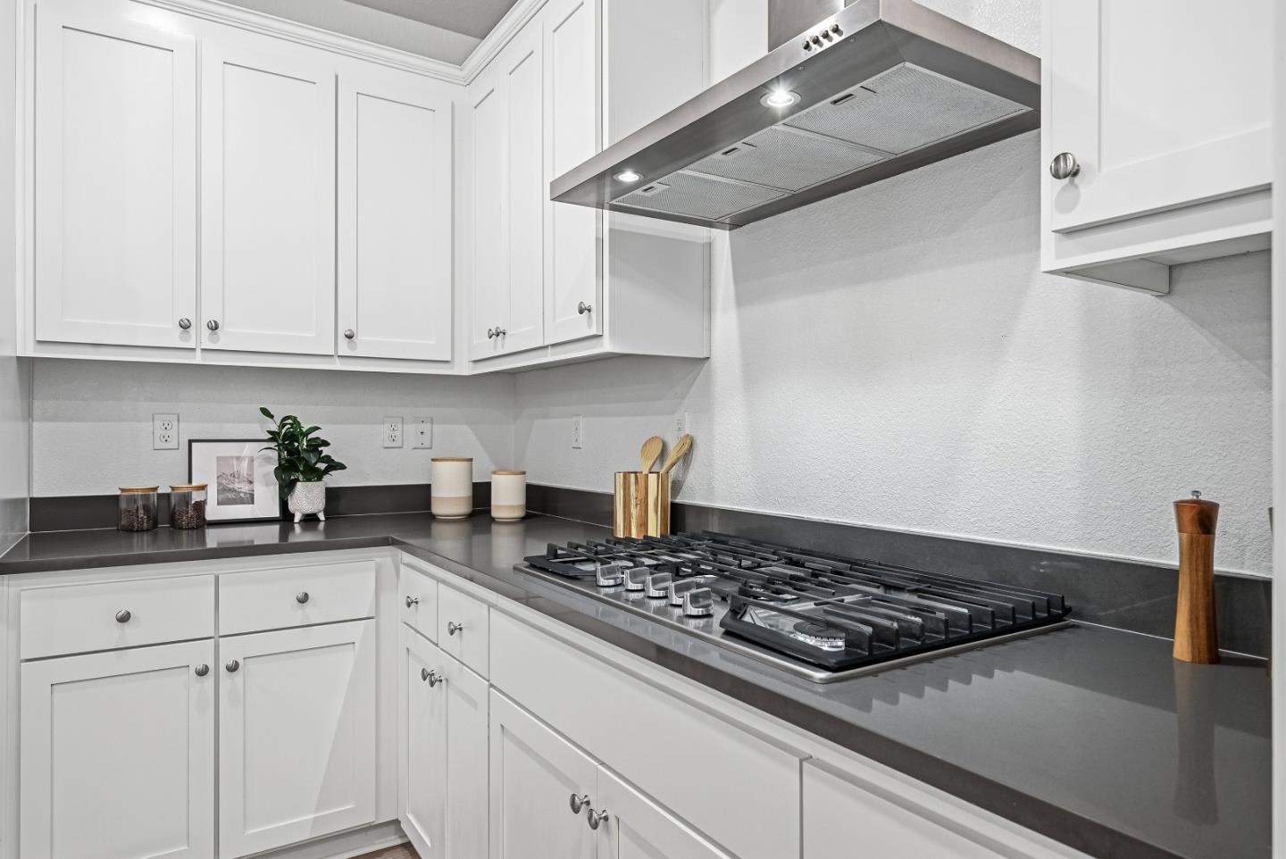 3140 Blanco Terrace Fremont, CA 94536 - Photo 11 of 35 a kitchen with granite countertop a sink stove and cabinets