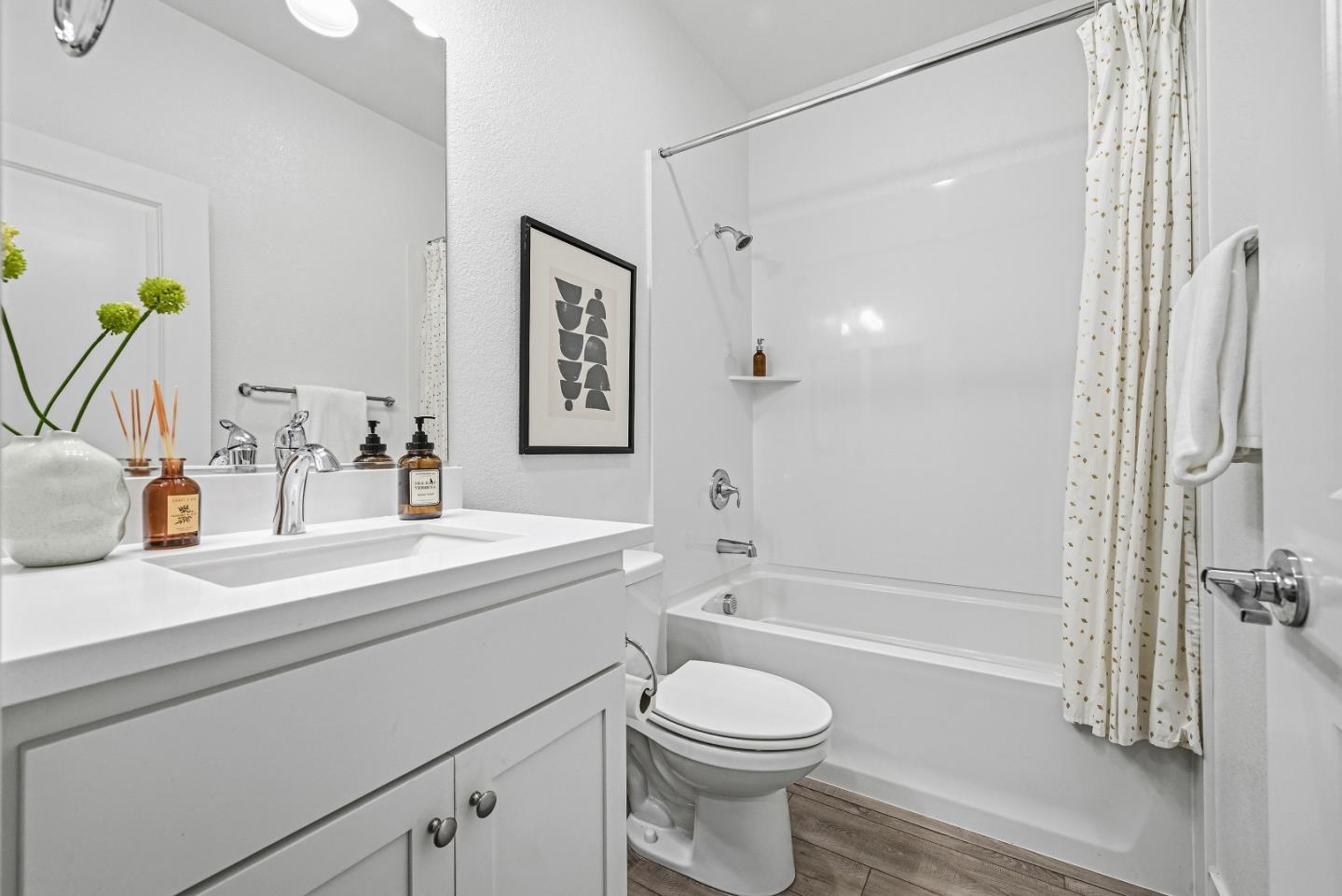 3140 Blanco Terrace Fremont, CA 94536 - Photo 12 of 35 a bathroom with a sink a toilet and shower