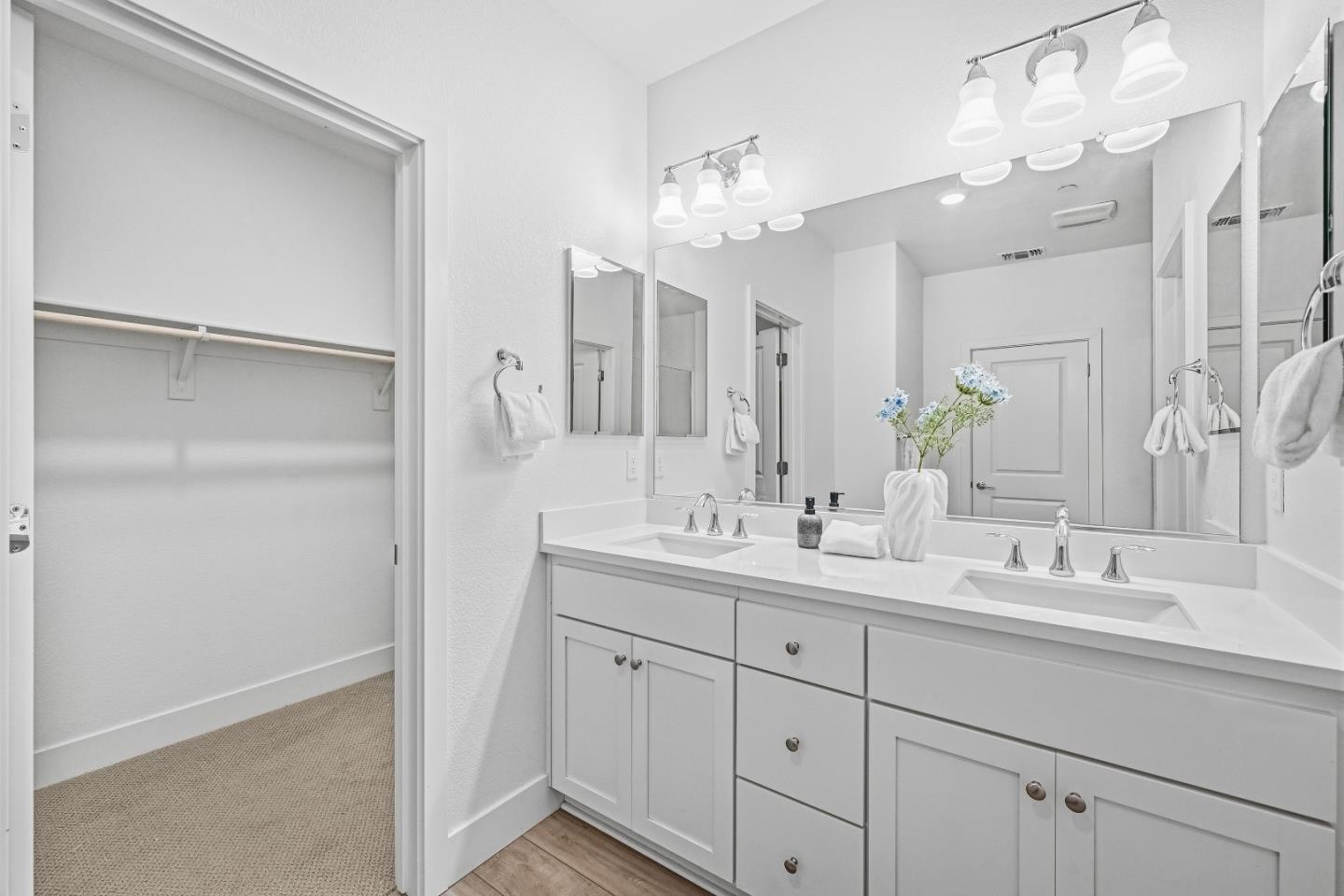 3140 Blanco Terrace Fremont, CA 94536 - Photo 24 of 35 a bathroom with a double vanity sink mirror and next to a white cabinet
