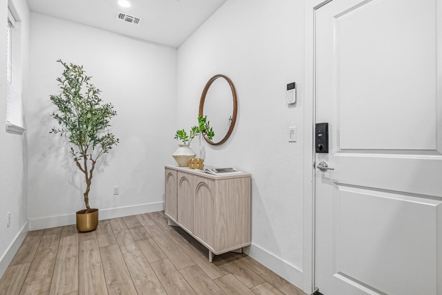 3140 Blanco Terrace Fremont, CA 94536 - Photo 26 of 35 a view of a room with wooden floor and potted plant