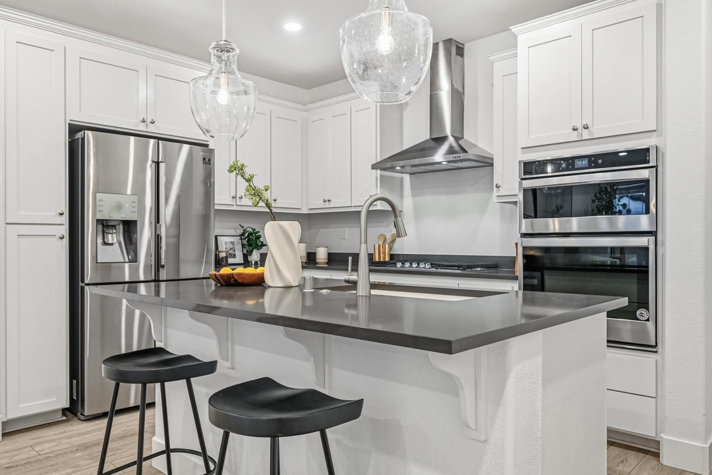 3140 Blanco Terrace Fremont, CA 94536 - Photo 7 of 35 a kitchen with stainless steel appliances a stove a refrigerator and a refrigerator