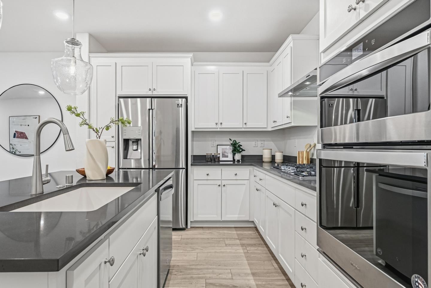 3140 Blanco Terrace Fremont, CA 94536 - Photo 10 of 35 a kitchen with granite countertop a sink stove and refrigerator