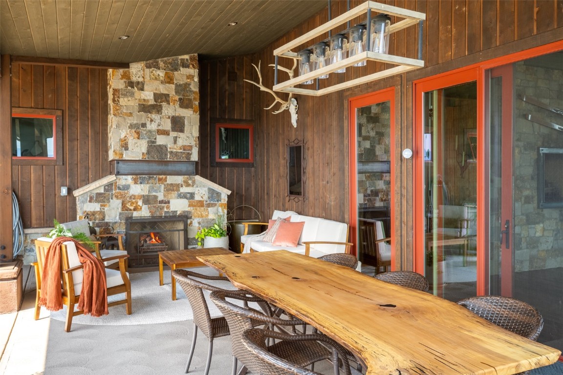 28100 Columbine Ridge Road Steamboat Springs, CO 80487 - Photo 15 of 43 a dining room with a table and chairs