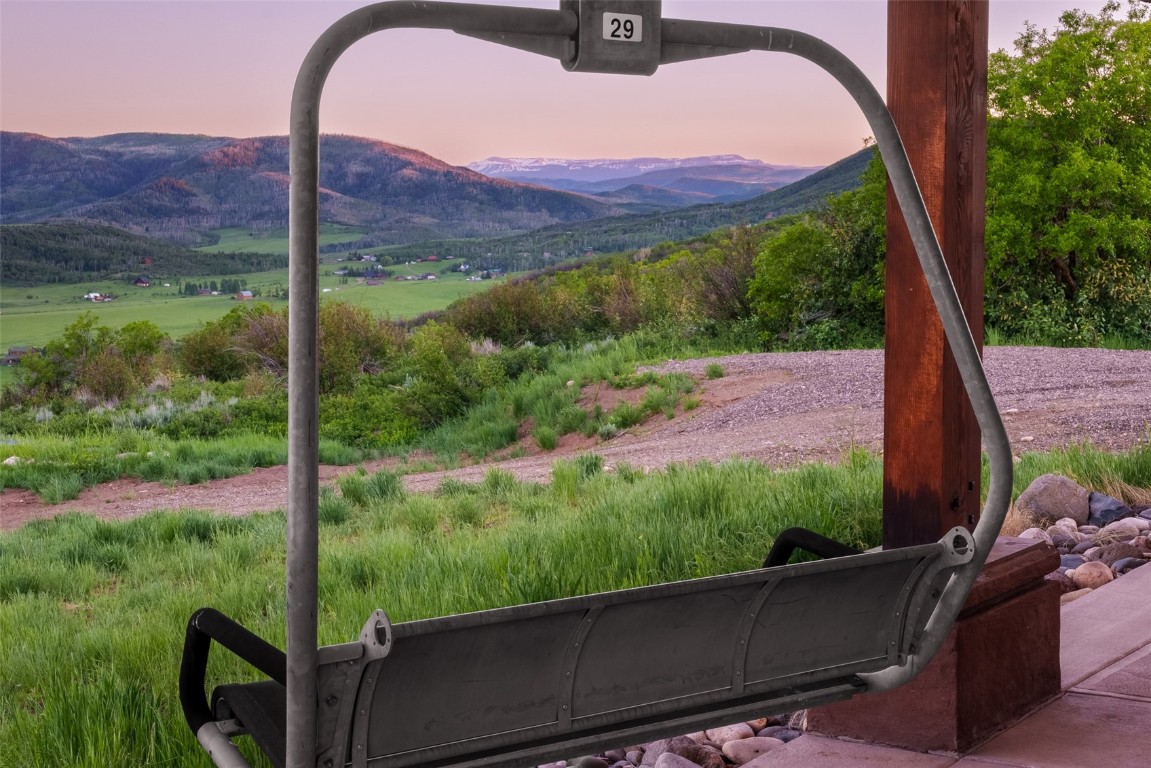 28100 Columbine Ridge Road Steamboat Springs, CO 80487 - Photo 19 of 43 a view of a back yard from a balcony