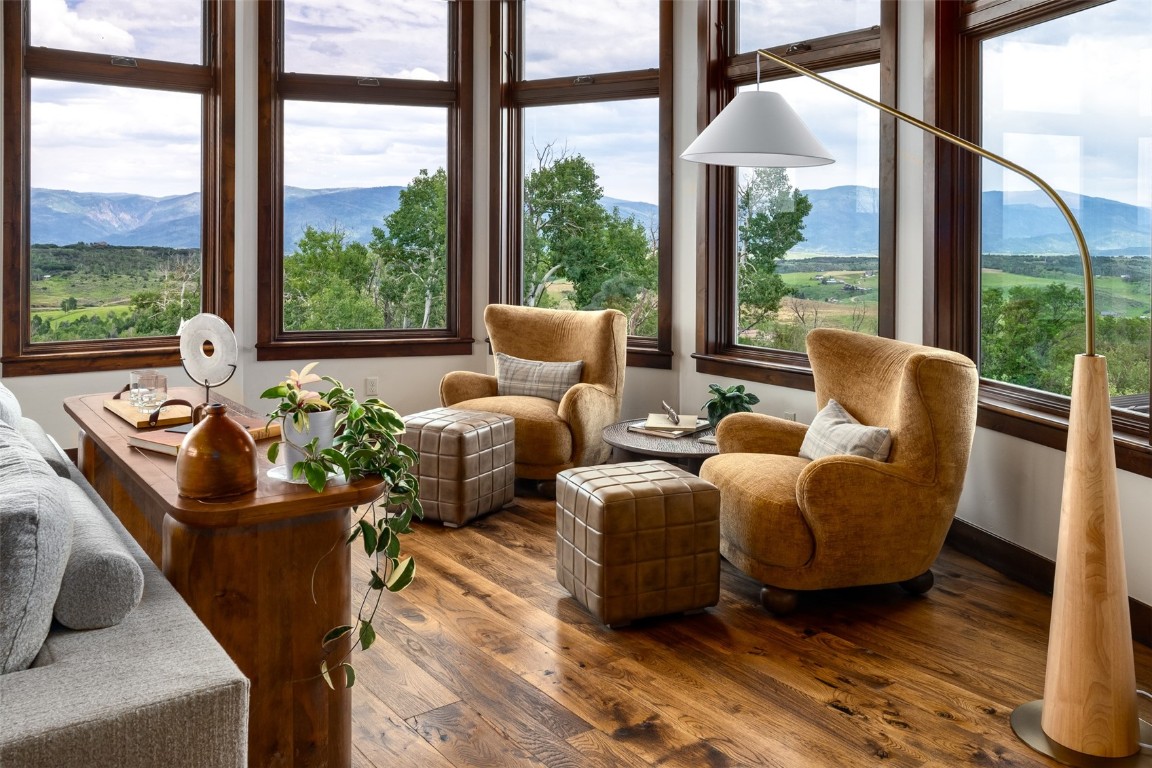 28100 Columbine Ridge Road Steamboat Springs, CO 80487 - Photo 8 of 43 a living room with furniture and a large window