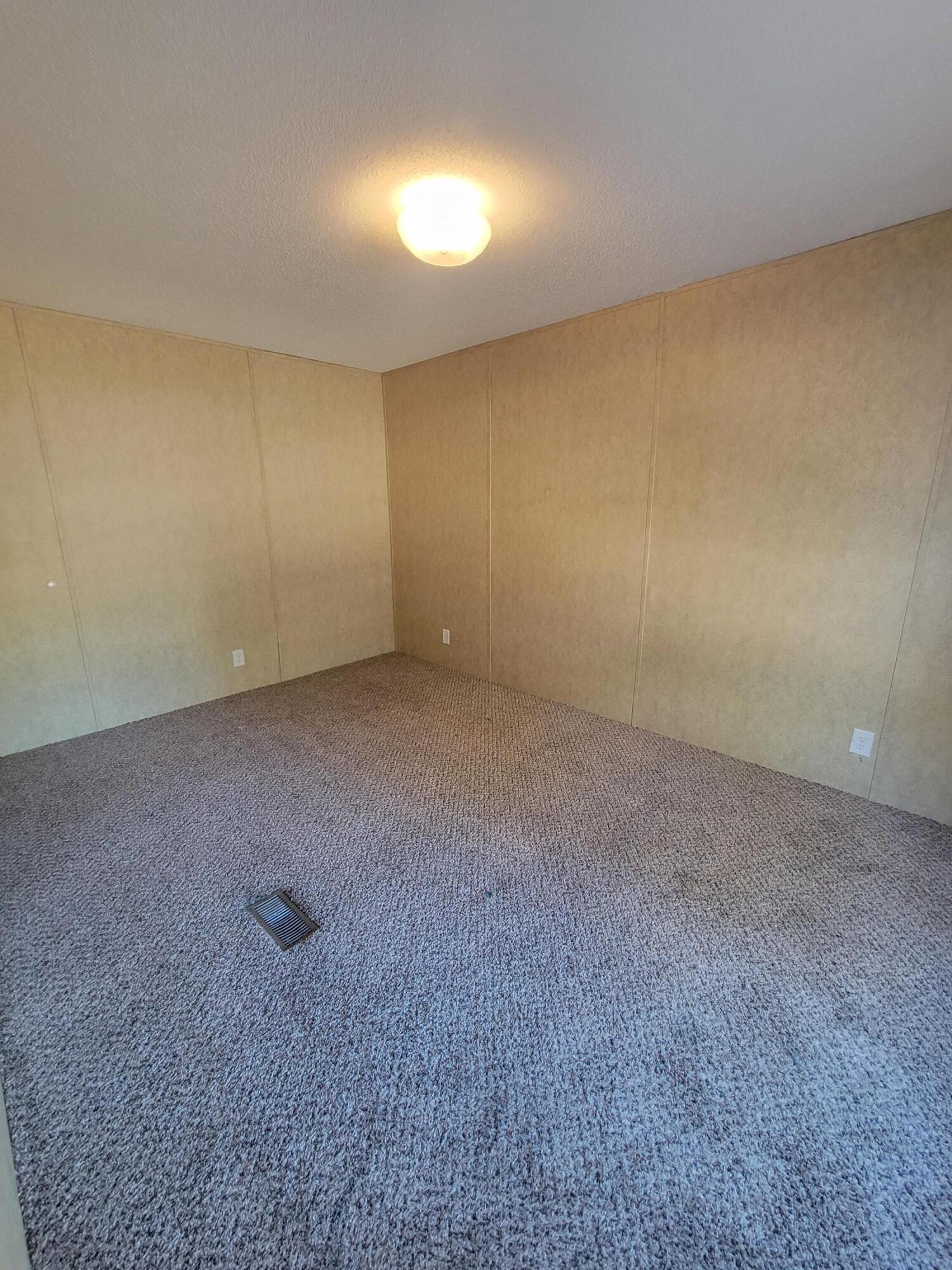 188 O'Daniels Way DeFuniak Springs, FL 32433 - Photo 12 of 17 a view of an empty room and window