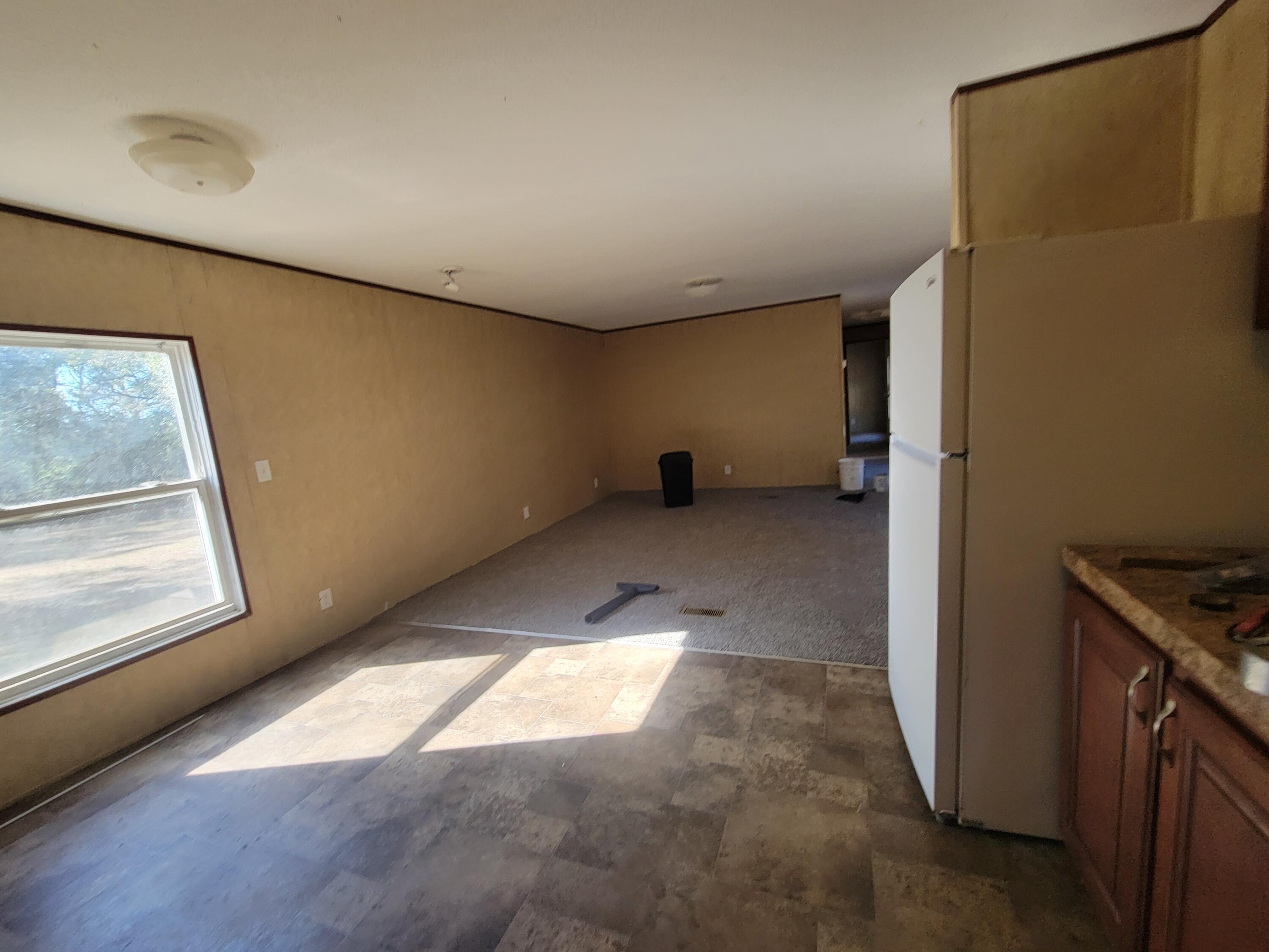 188 O'Daniels Way DeFuniak Springs, FL 32433 - Photo 9 of 17 a view of livingroom with window