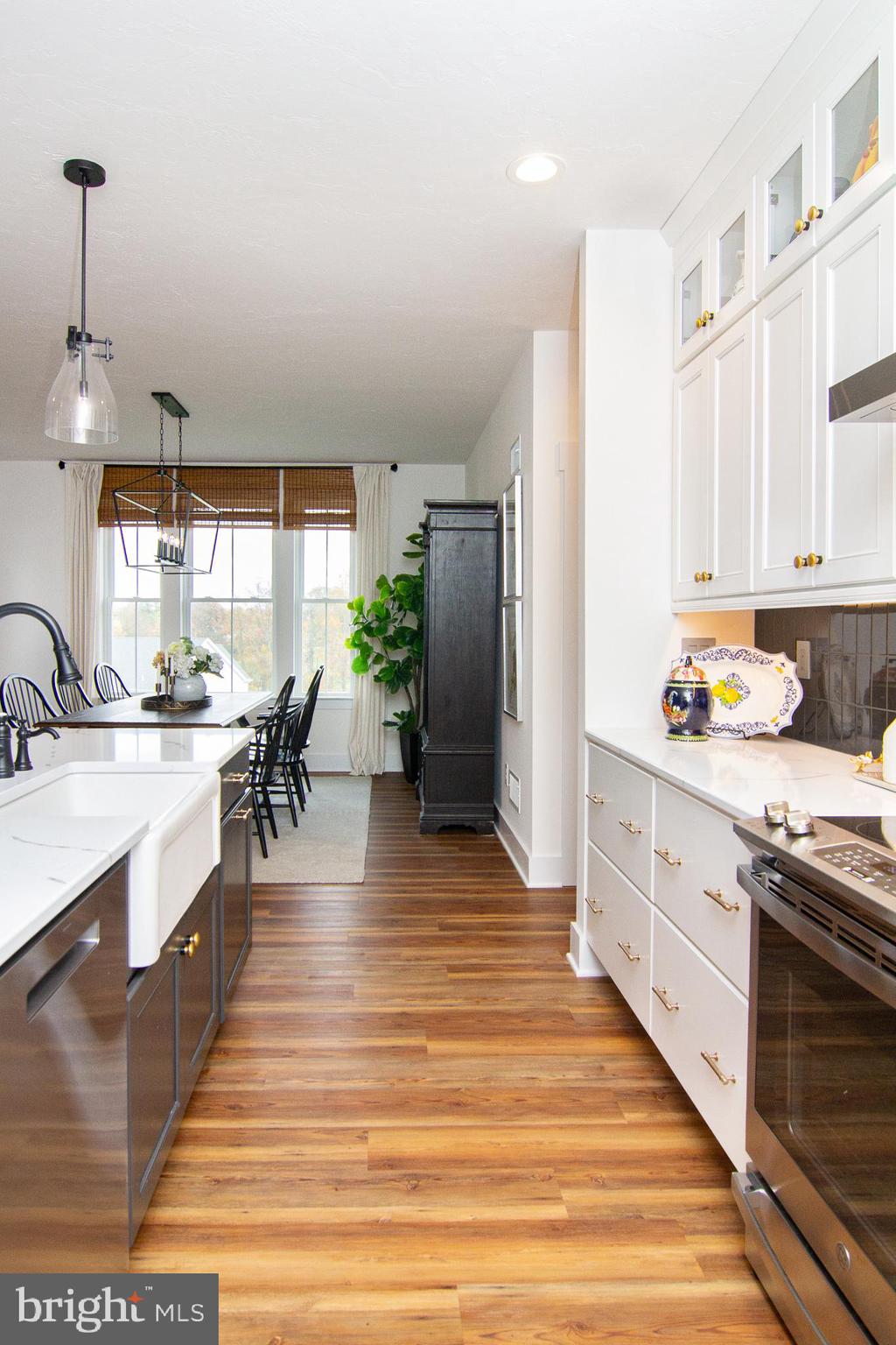 P39 Schalk Road Manchester, MD 21102 - Photo 10 of 20 a large kitchen with granite countertop a large counter top stainless steel appliances and cabinets