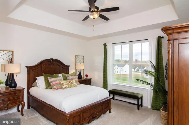 a kitchen with stainless steel appliances granite countertop a refrigerator and a stove