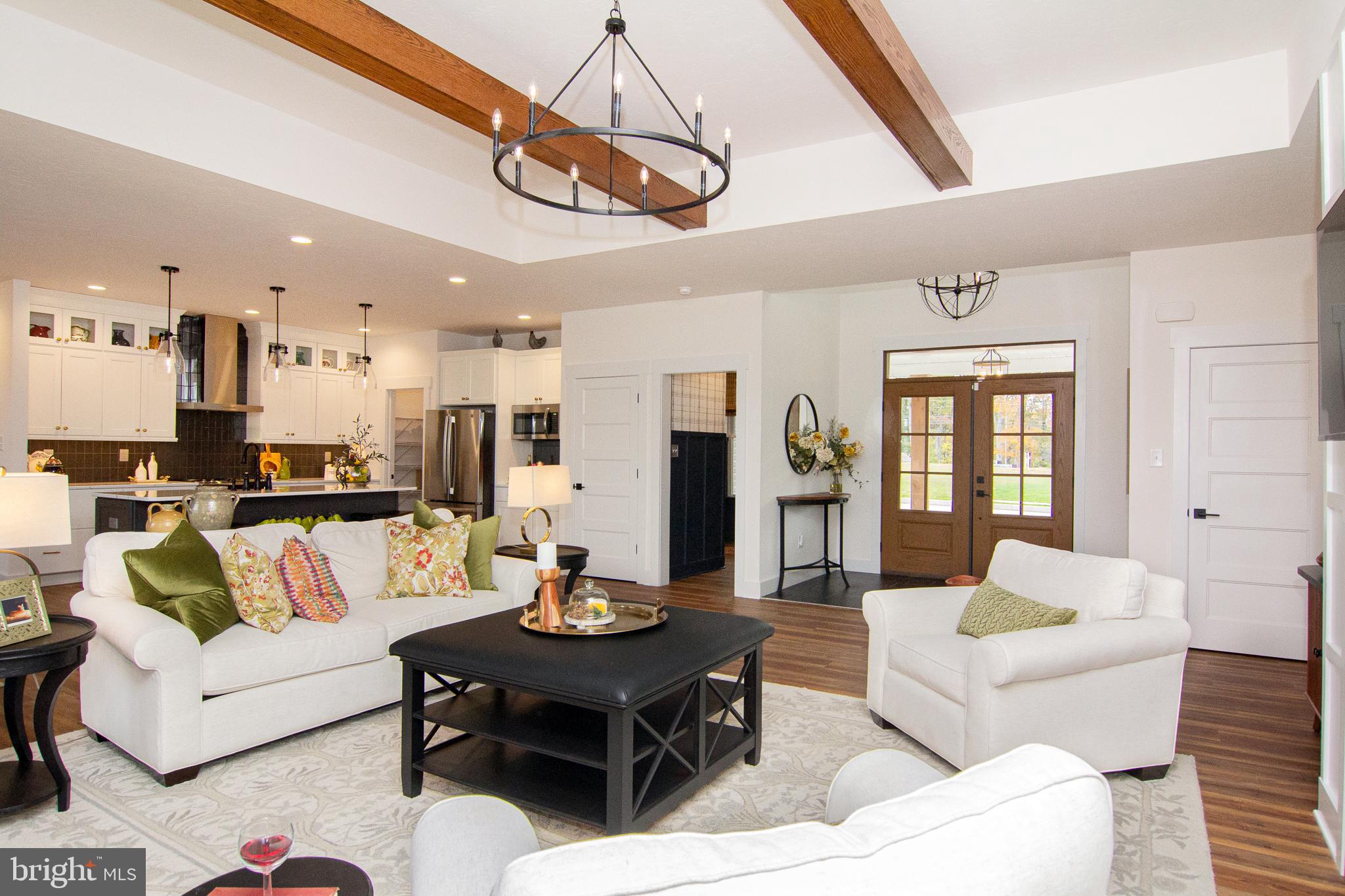 P39 Schalk Road Manchester, MD 21102 - Photo 20 of 20 a living room with furniture kitchen view and a chandelier