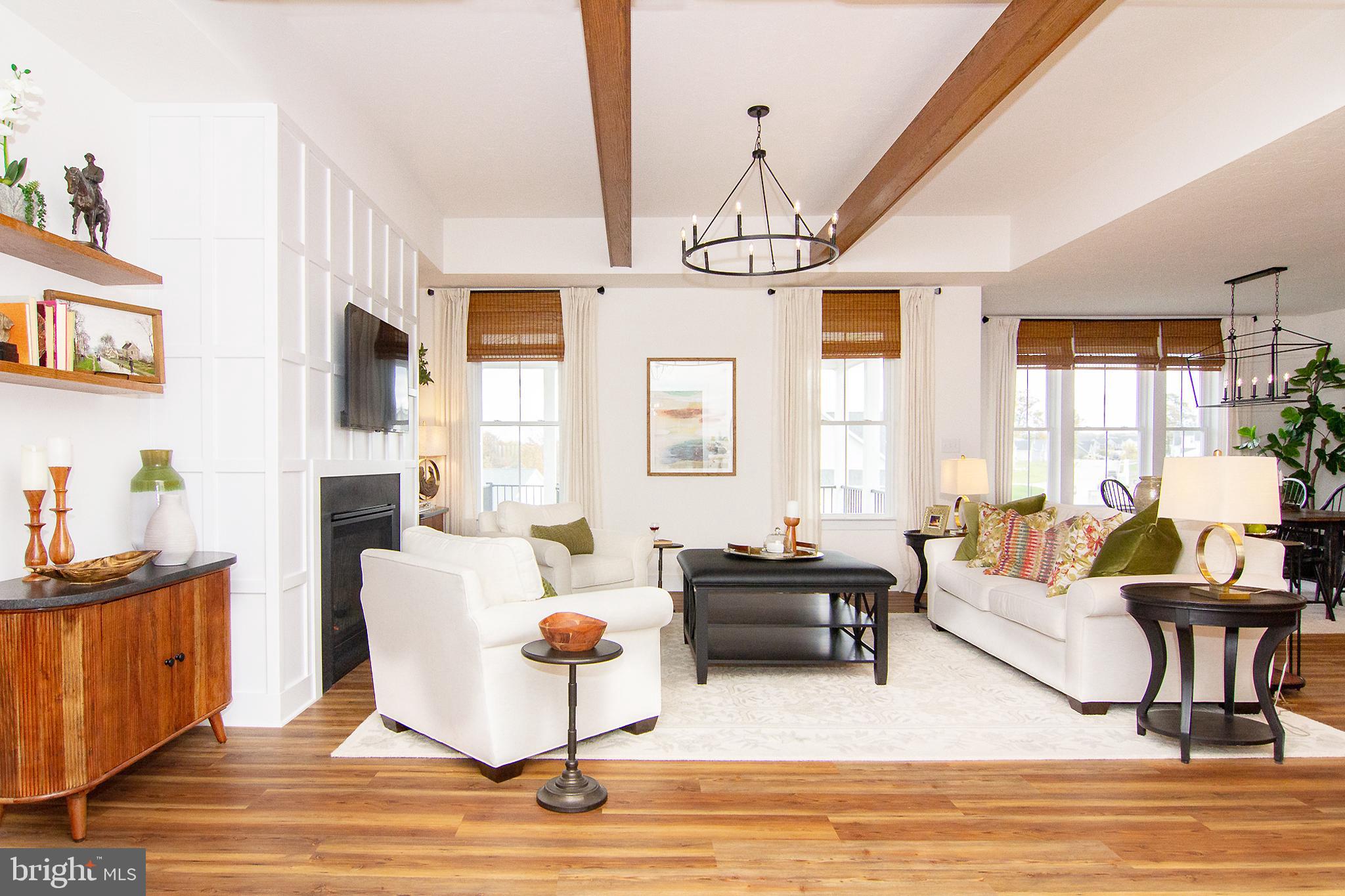 P39 Schalk Road Manchester, MD 21102 - Photo 4 of 20 a living room with fireplace furniture and a floor to ceiling window