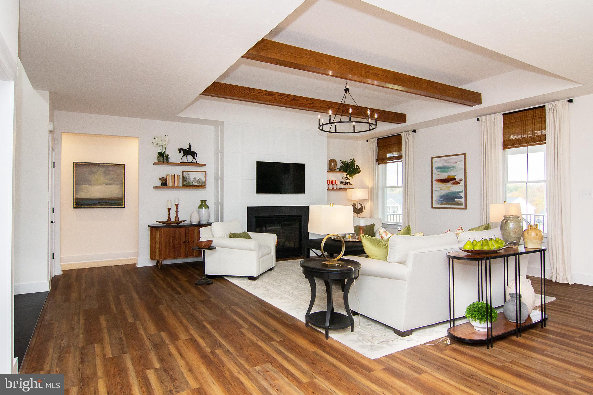 P39 Schalk Road Manchester, MD 21102 - Photo 6 of 20 a living room with fireplace furniture and a wooden floor
