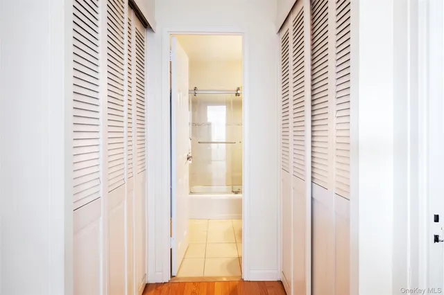 a view of a closet area with windows