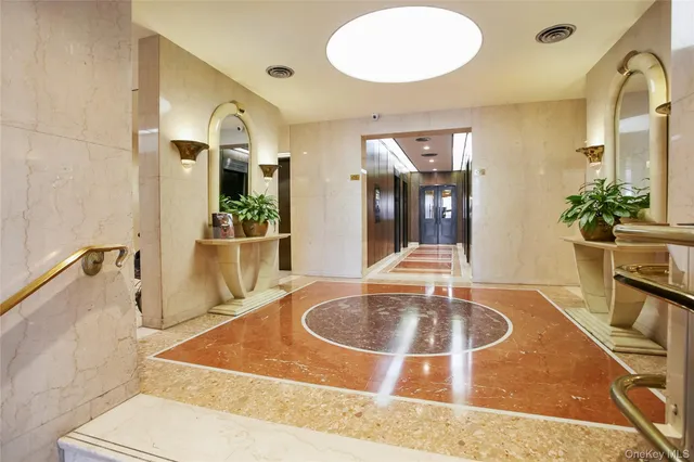 a view of a terrace with sitting area