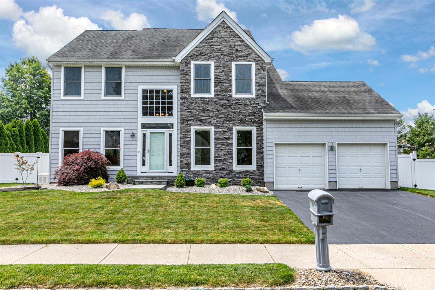 30 Aster Way Dayton, NJ 08810 - Photo 1 of 38 a front view of a house with a yard