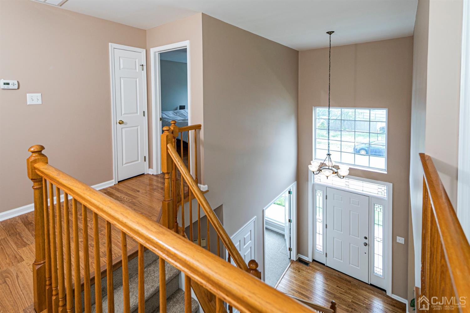 30 Aster Way Dayton, NJ 08810 - Photo 18 of 38 a view of a hallway with windows and entryway