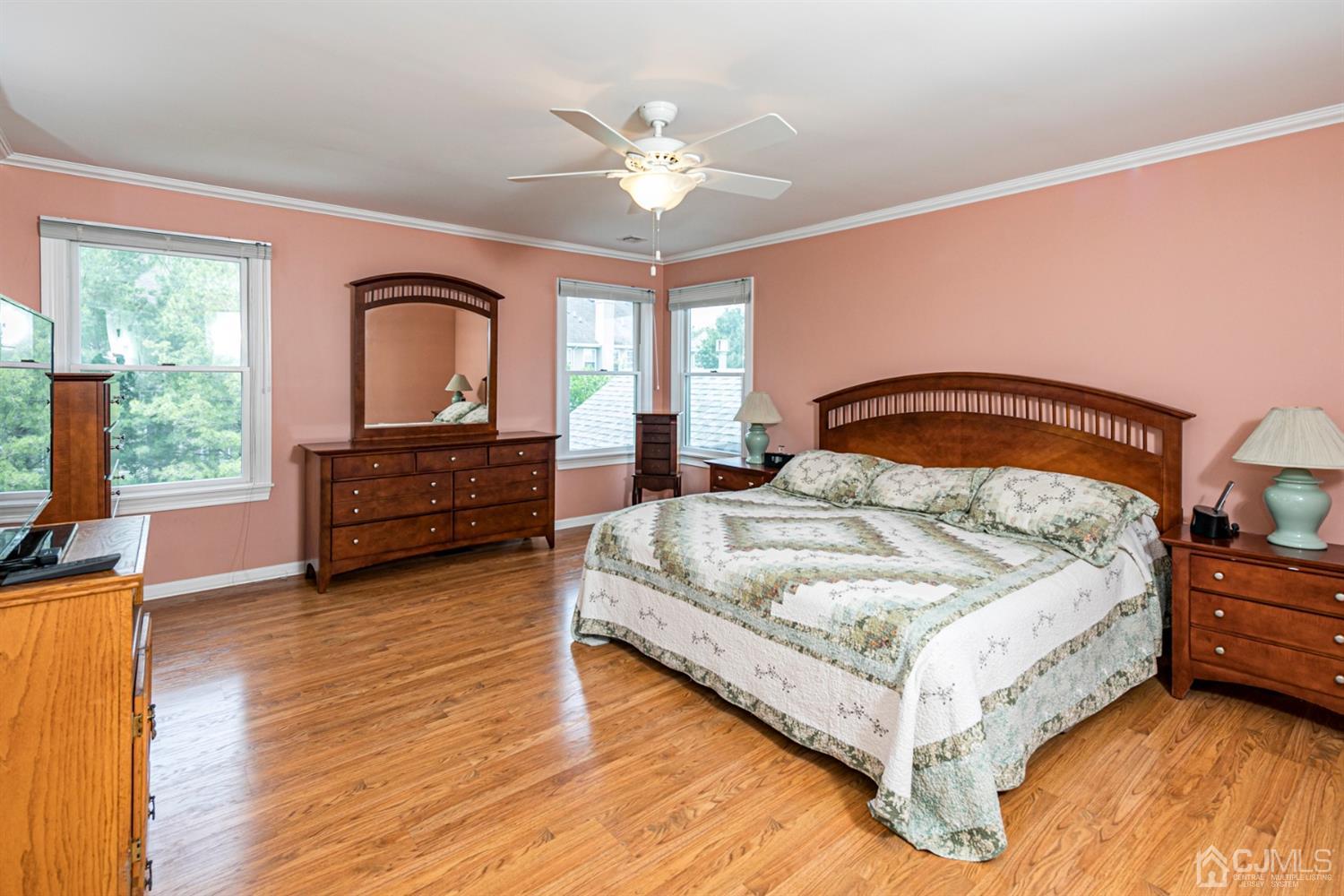30 Aster Way Dayton, NJ 08810 - Photo 19 of 38 a bedroom with a bed chair and a large window