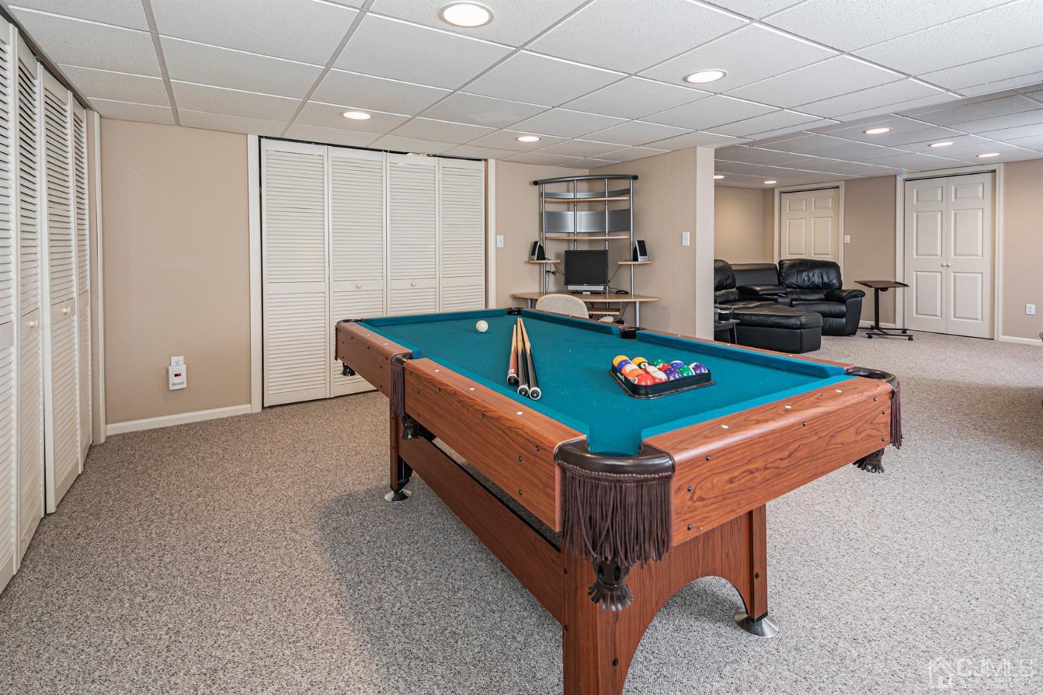 30 Aster Way Dayton, NJ 08810 - Photo 27 of 38 a room with pool table and a couch