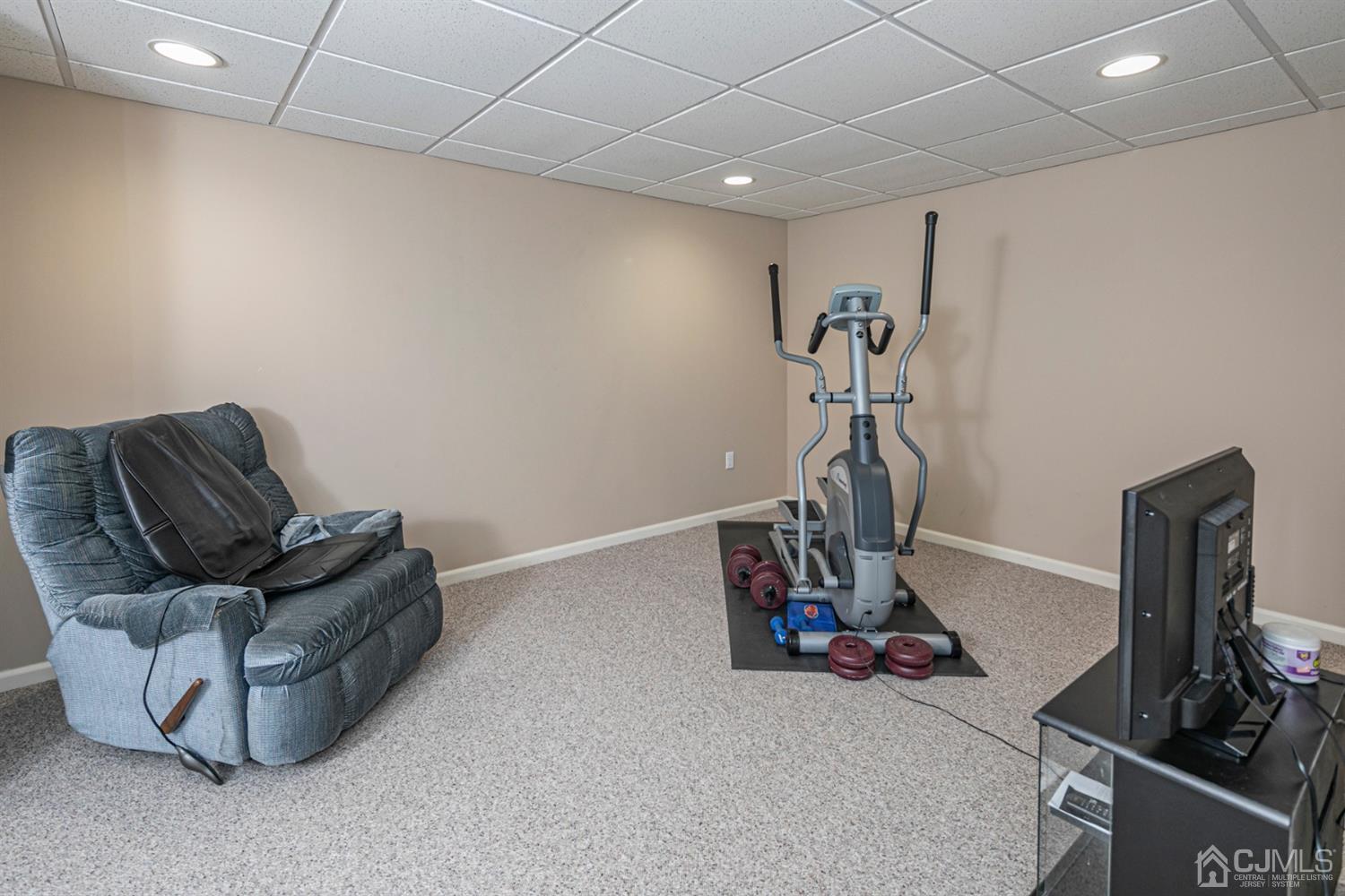 30 Aster Way Dayton, NJ 08810 - Photo 28 of 38 a view of a room with gym equipment