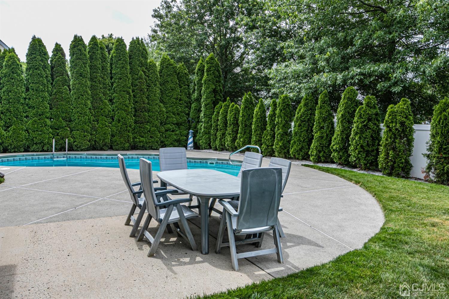 30 Aster Way Dayton, NJ 08810 - Photo 33 of 38 a patio with table and chairs
