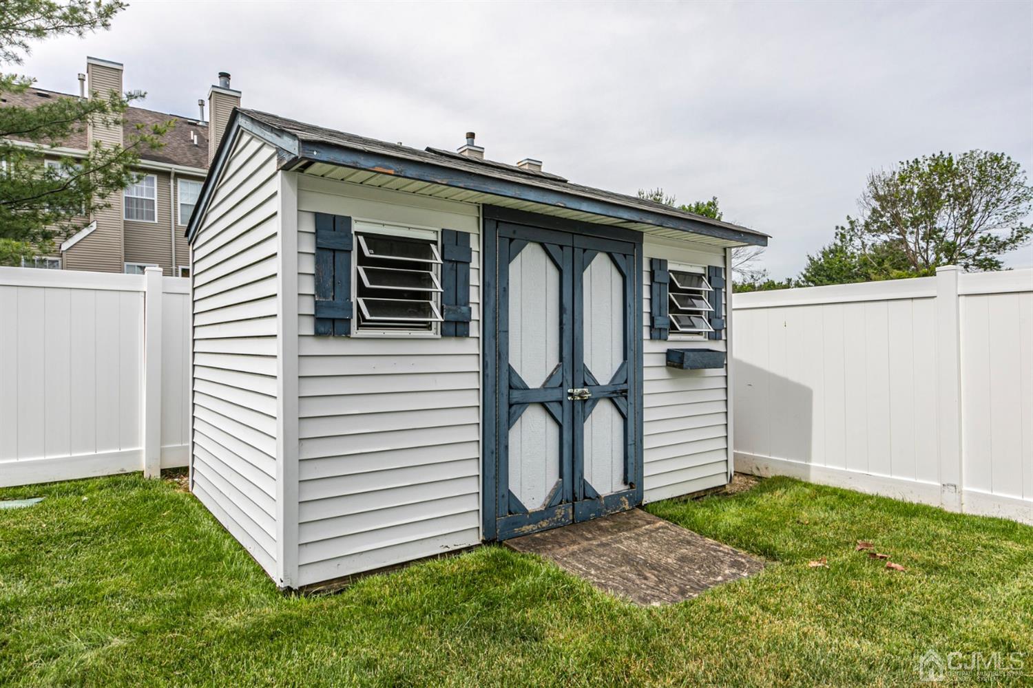 30 Aster Way Dayton, NJ 08810 - Photo 34 of 38 a front view of a house with garden