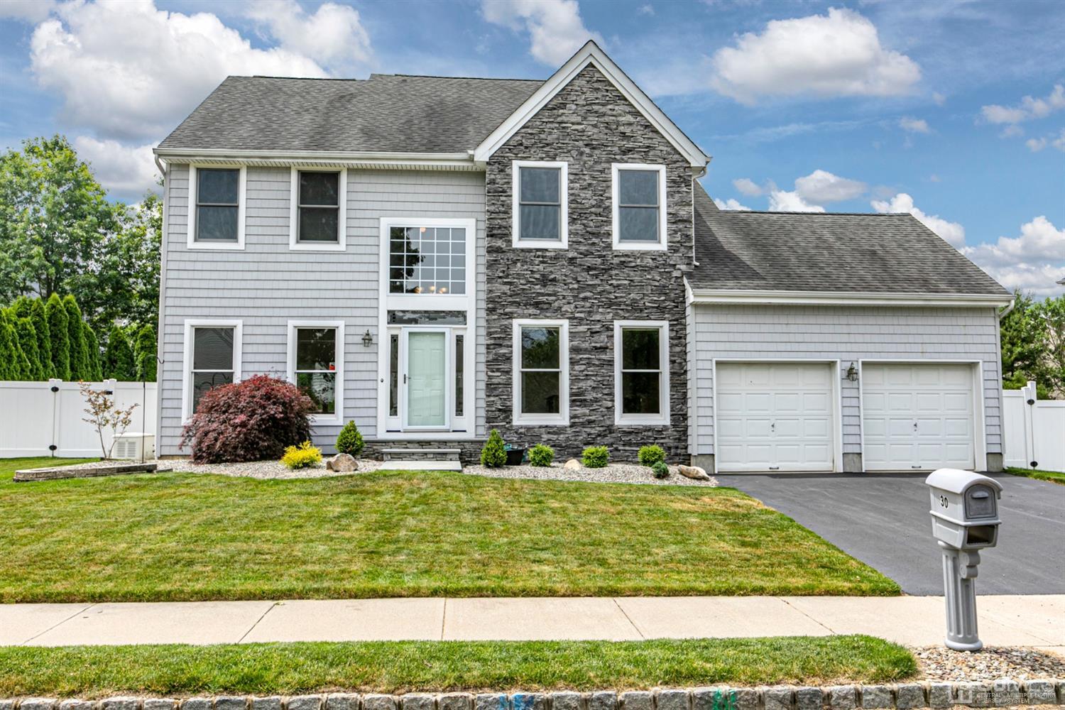 30 Aster Way Dayton, NJ 08810 - Photo 35 of 38 a front view of a house with a yard