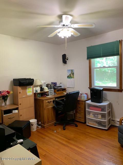 204 Winona Road Mount Pocono, PA 18344 - Photo 24 of 41 a room with furniture and a flat screen tv