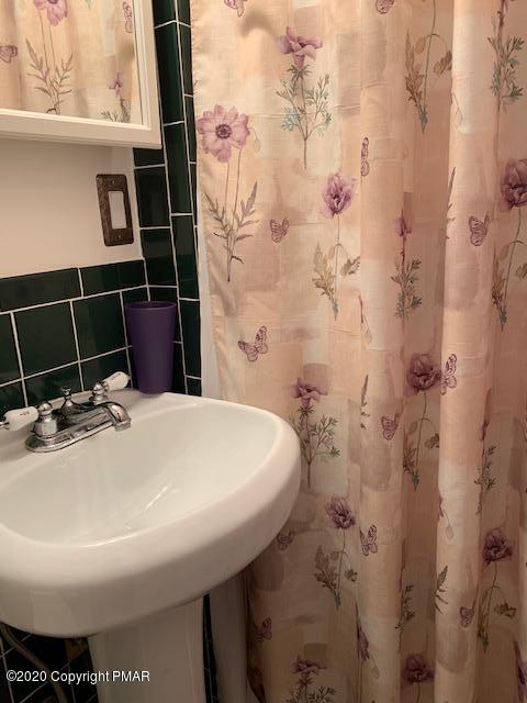 204 Winona Road Mount Pocono, PA 18344 - Photo 28 of 41 a bathroom with a sink toilet and shower