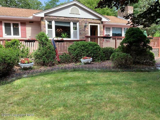 204 Winona Road Mount Pocono, PA 18344 - Photo 3 of 41 a view of a house with a yard and plants