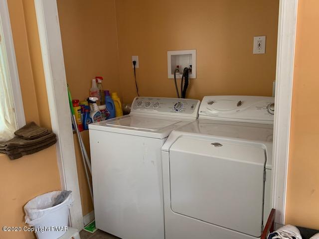 204 Winona Road Mount Pocono, PA 18344 - Photo 31 of 41 a utility room with dryer and washer