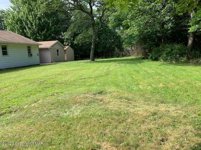 204 Winona Road Mount Pocono, PA 18344 - Photo 33 of 41 a view of a house with a backyard