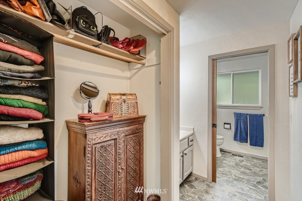 22420 61st Avenue Southeast Bothell, WA 98021 - Photo 14 of 39 a view of walk in closet with clothes and shoes