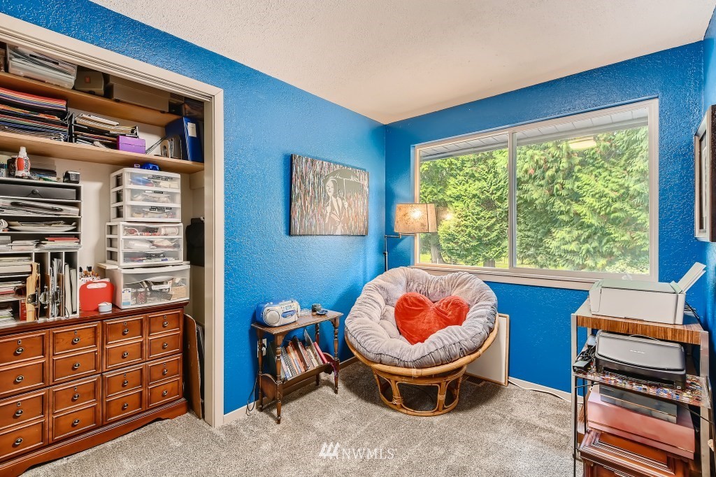 22420 61st Avenue Southeast Bothell, WA 98021 - Photo 21 of 39 a room with furniture and window